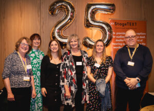 Stagetext captioners including Lynn Jackon (centre) at Stagetext's 25th anniversary celebration. Photo credit: Malachy Luckie